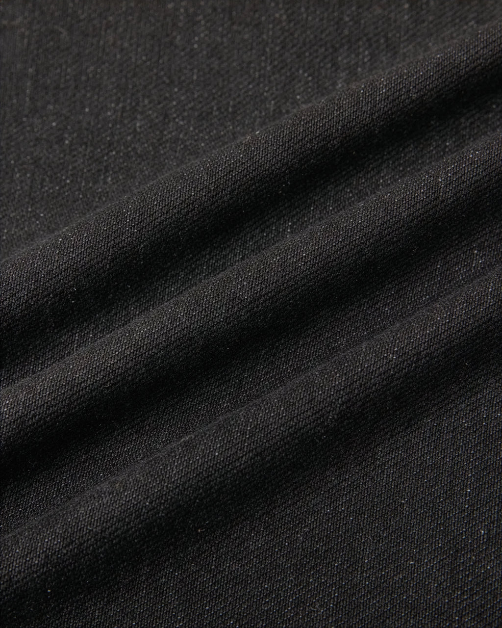 VENT D'HIVER™ Vintage Wash Denim in black featuring a wide-leg fit, vintage washed finish, and signature Angel Collection print at the back pocket.