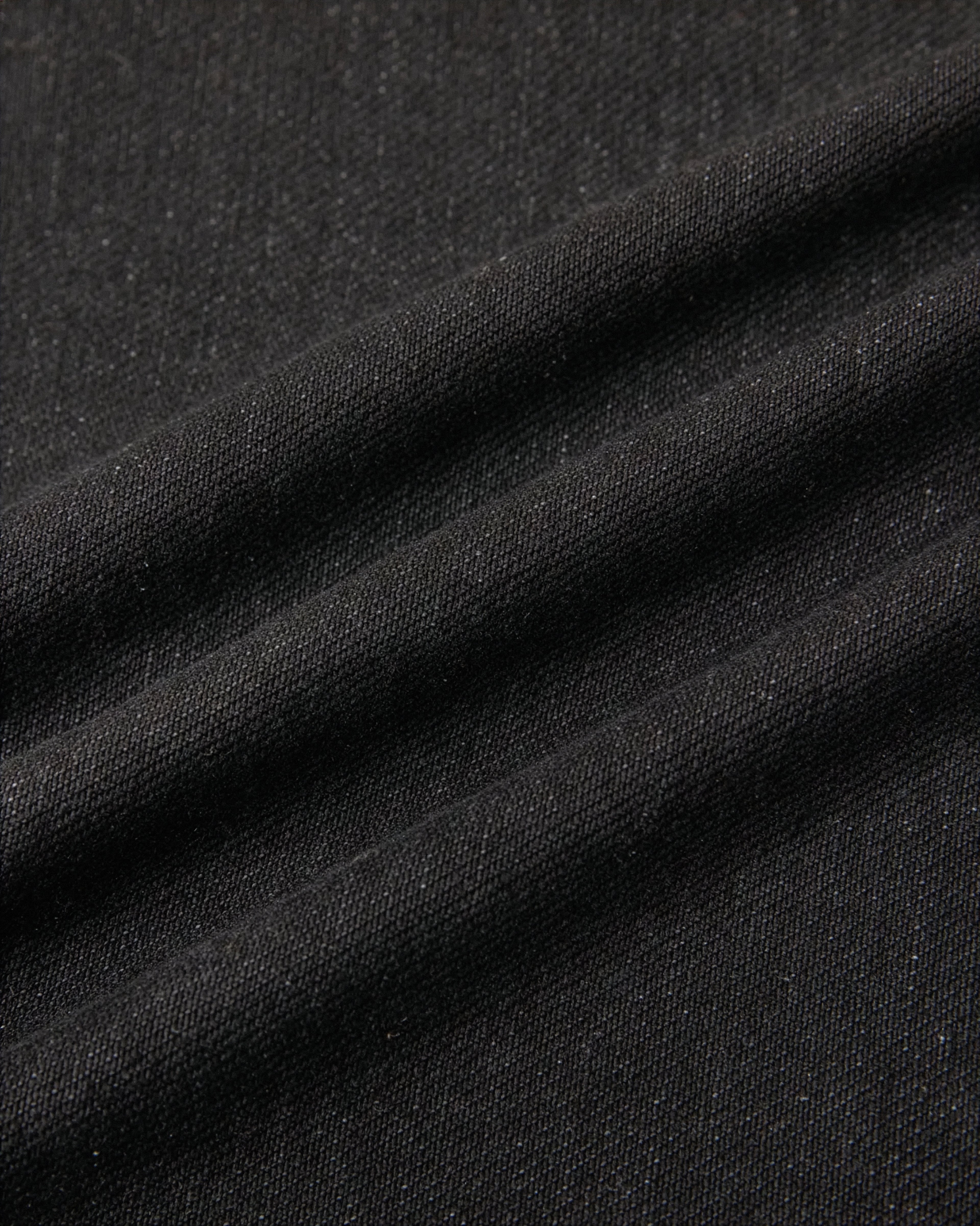 VENT D'HIVER™ Vintage Wash Denim in black featuring a wide-leg fit, vintage washed finish, and signature Angel Collection print at the back pocket.