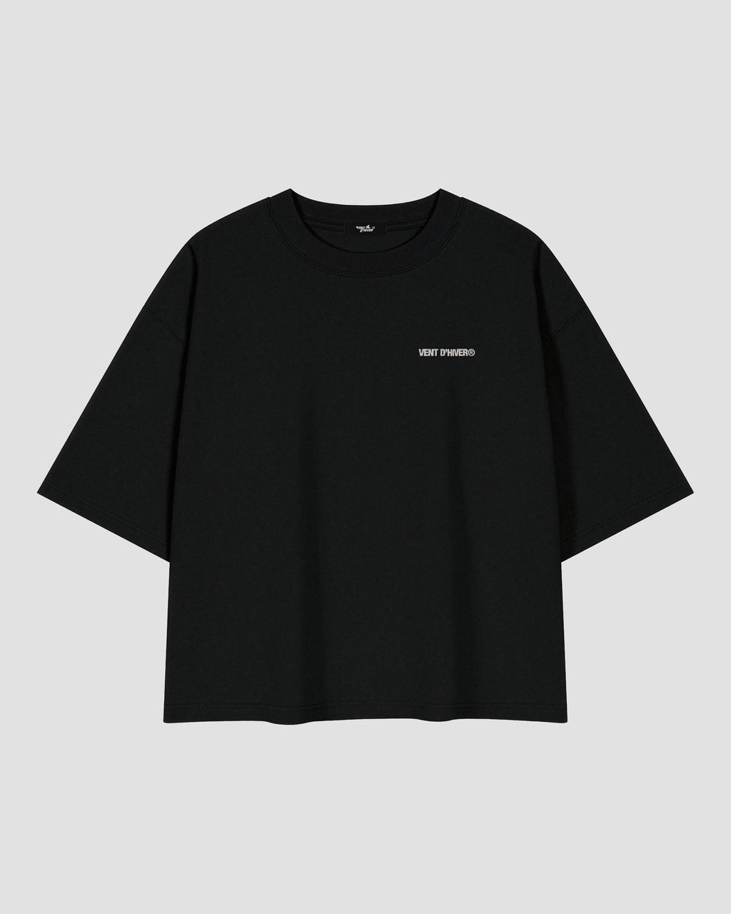 Black oversized heavyweight cotton T-shirt featuring a small white VENT D'HIVER® logo on the front chest. The back showcases a vintage monochrome illustration of Ma Barker holding a Thompson submachine gun, with large distressed "MA BARKER" typography and the phrase "FIERCEST WOMAN FROM OLD CHICAGO TOWN" beneath.