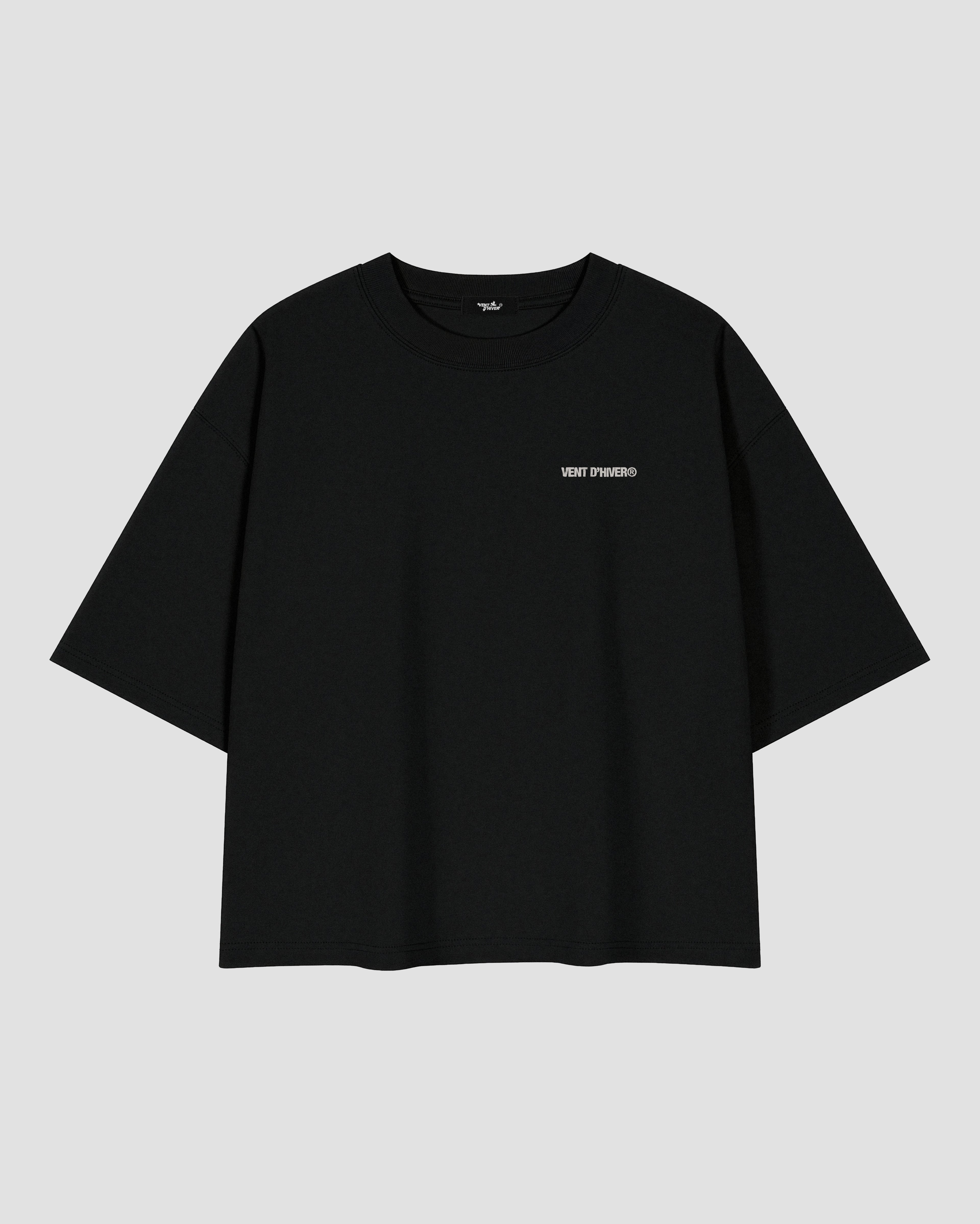 Black oversized heavyweight cotton T-shirt featuring a small white VENT D'HIVER® logo on the front chest. The back showcases a vintage monochrome illustration of Ma Barker holding a Thompson submachine gun, with large distressed "MA BARKER" typography and the phrase "FIERCEST WOMAN FROM OLD CHICAGO TOWN" beneath.
