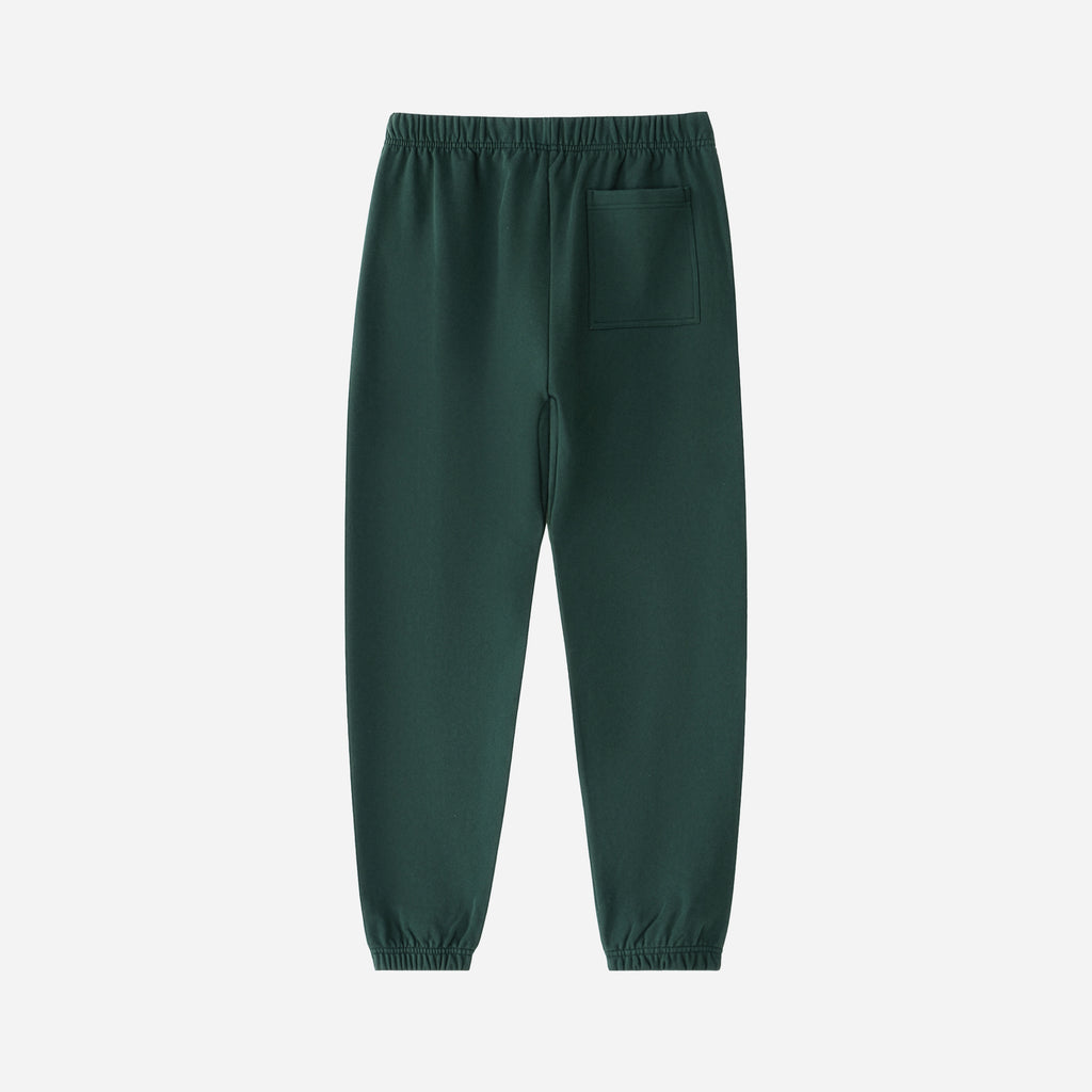 Green pants on a light gray background