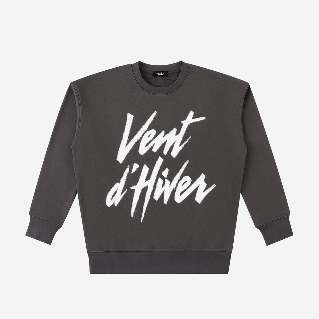 Dark gray sweatshirt with white text 'Vent d'Hiver' on a light gray background