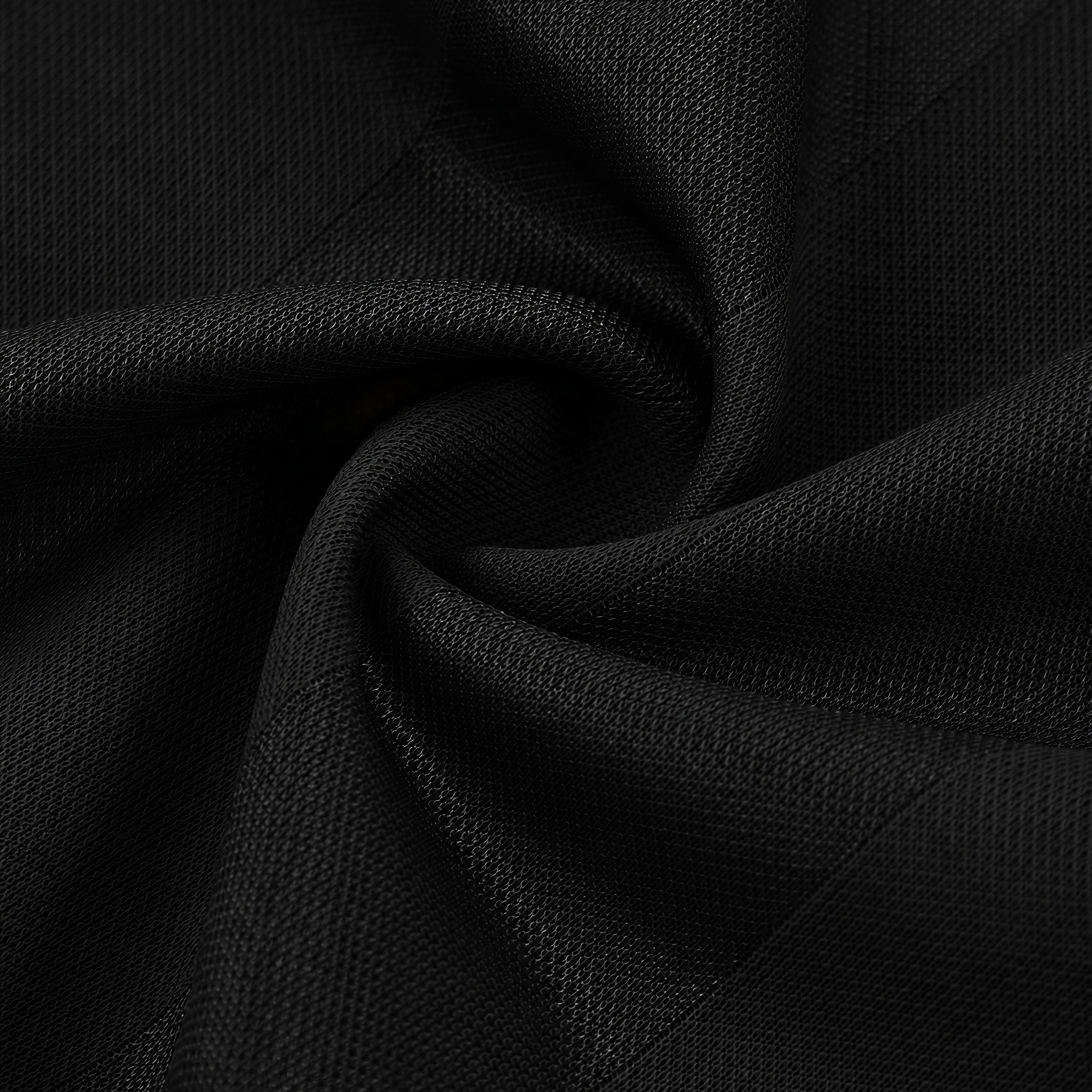 Close-up of black fabric with a textured surface