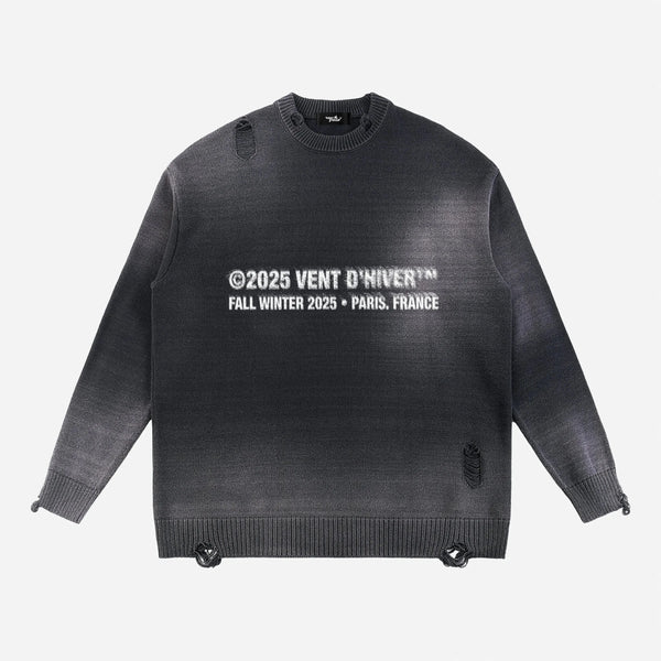 Gray sweater by VENT D'HIVER with collection text sprayed on a white background