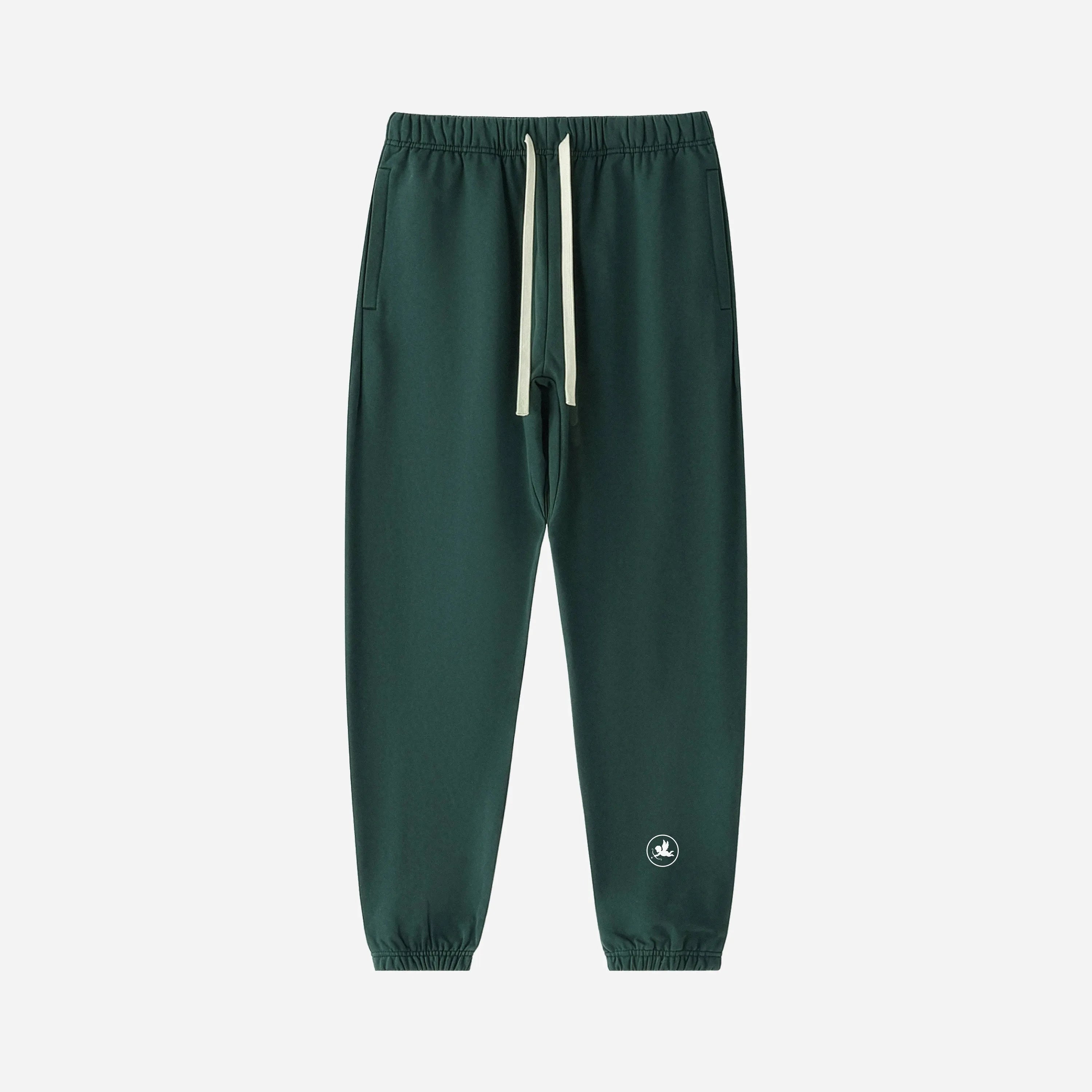 Green sweatpants pants by VENT D'HIVER with a small angel on a white background