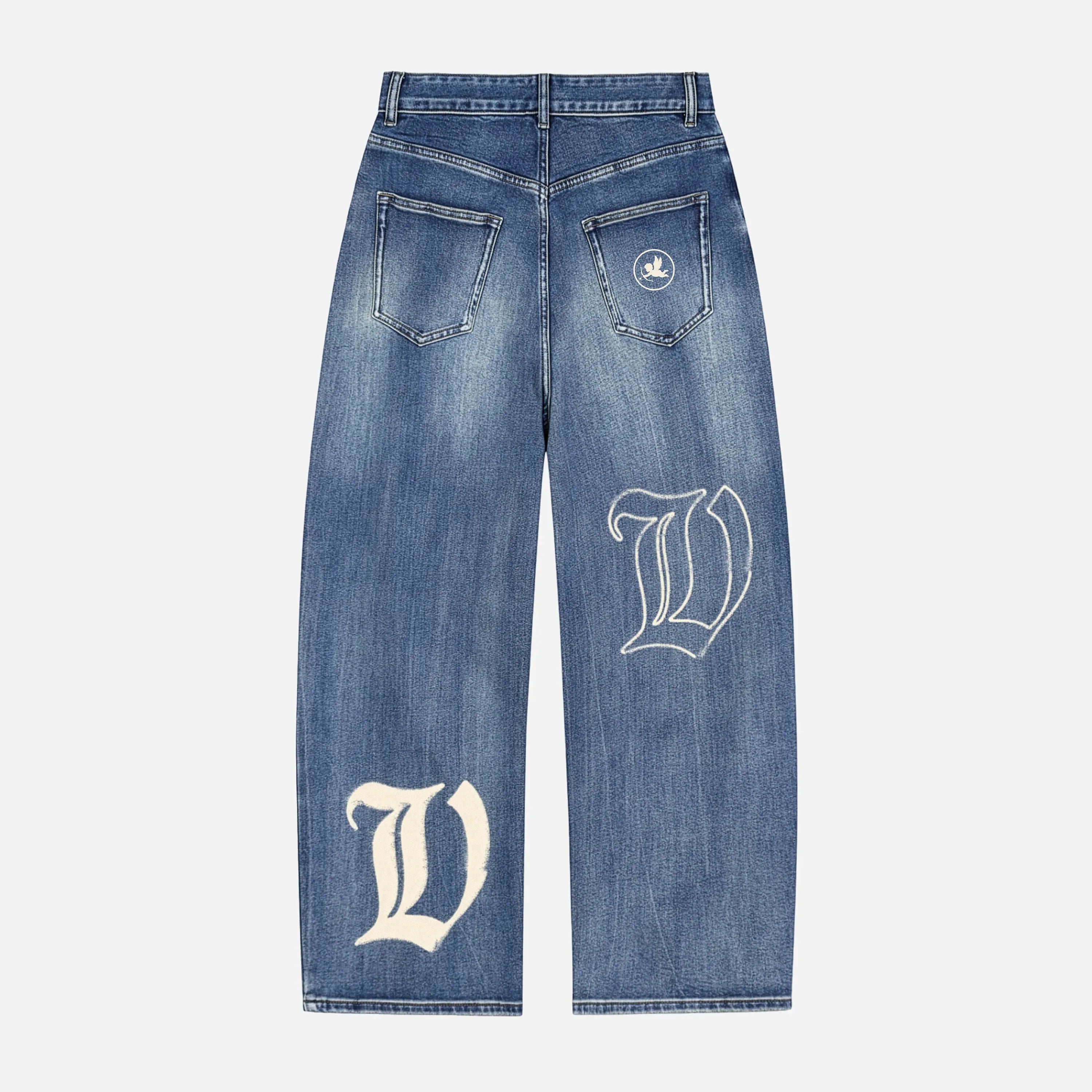 Blue jeans / denim by VENT D'HIVER with white letter 'V' design on a light gray background