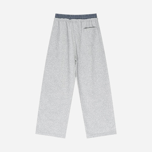 Gray sweatpants by VENT D'HIVER on a white background