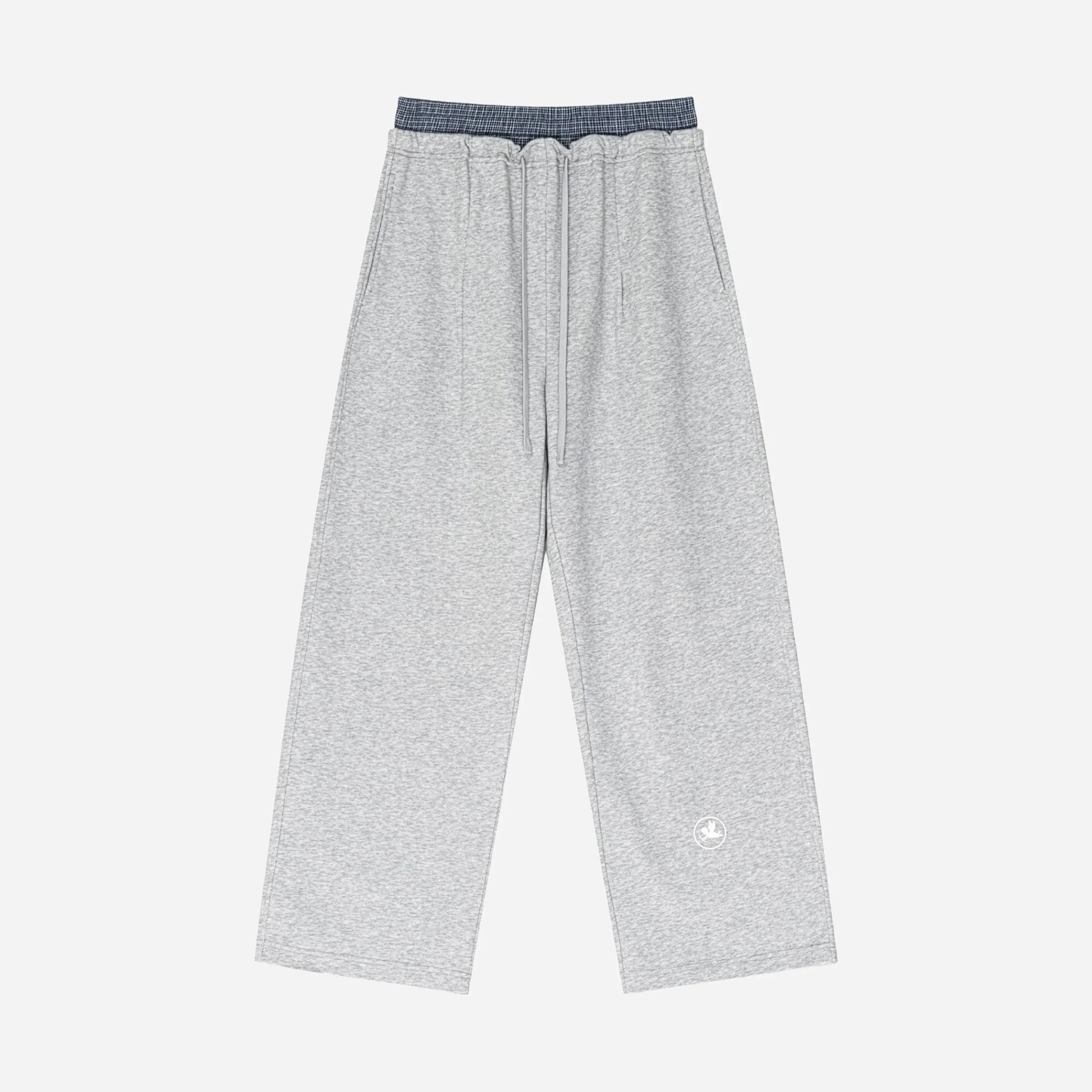 Gray sweatpants by VENT D'HIVER on a white background