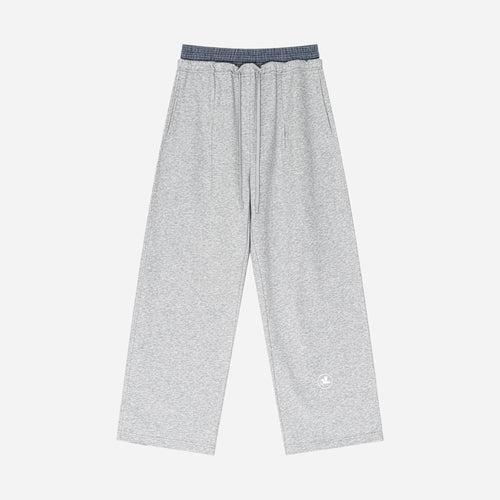Gray sweatpants by VENT D'HIVER on a white background