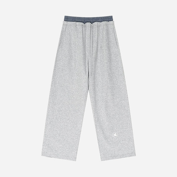 Gray sweatpants by VENT D'HIVER on a white background
