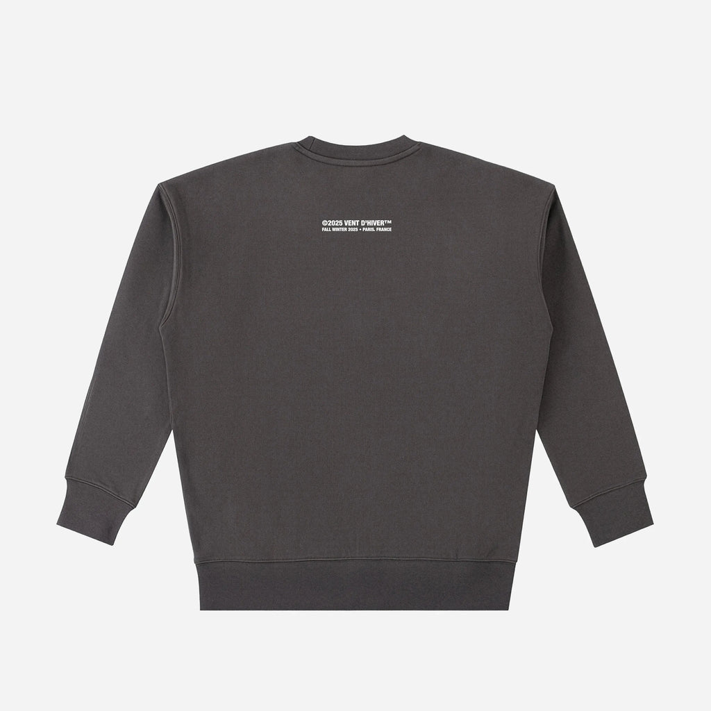 Dark gray sweatshirt by VENT D'HIVER with a small white logo on the back against a light gray background