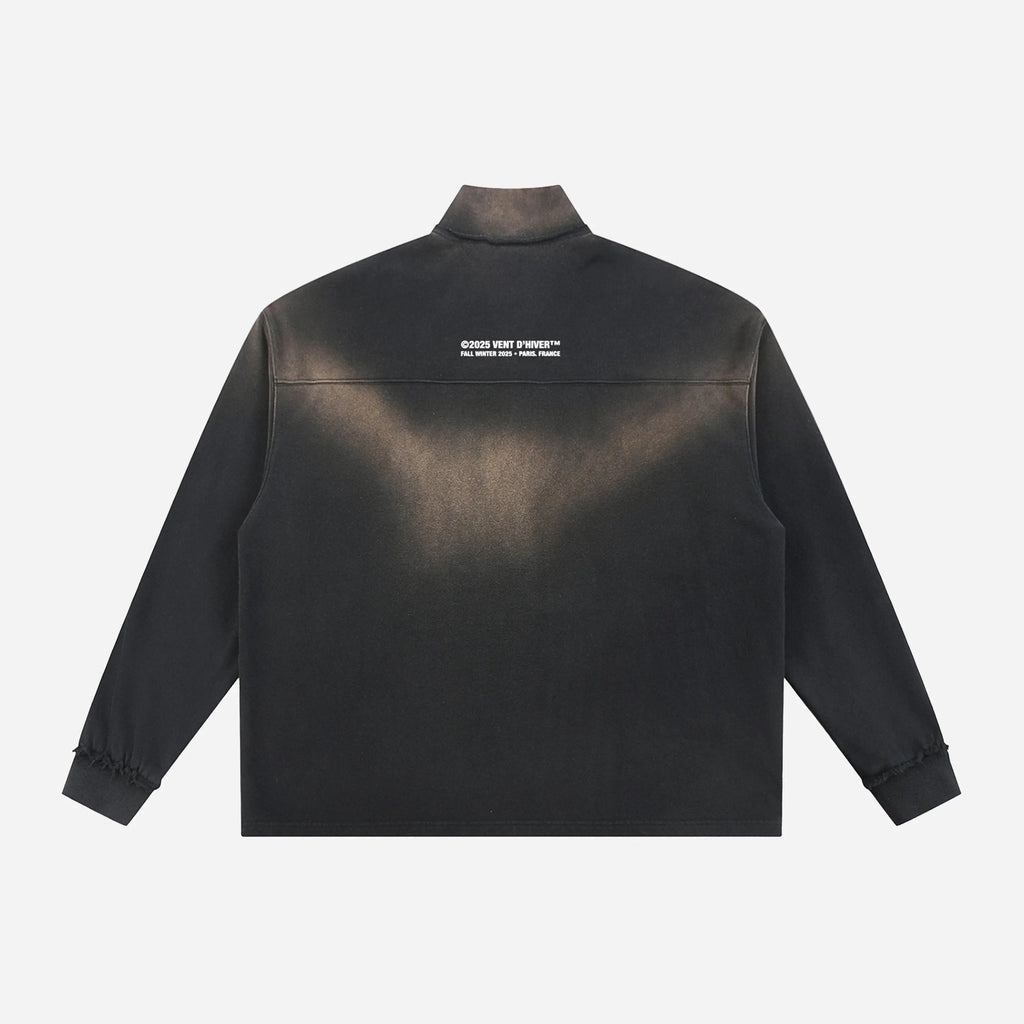 Quarter Zip by VENT D'HIVER with text on the back against a white background