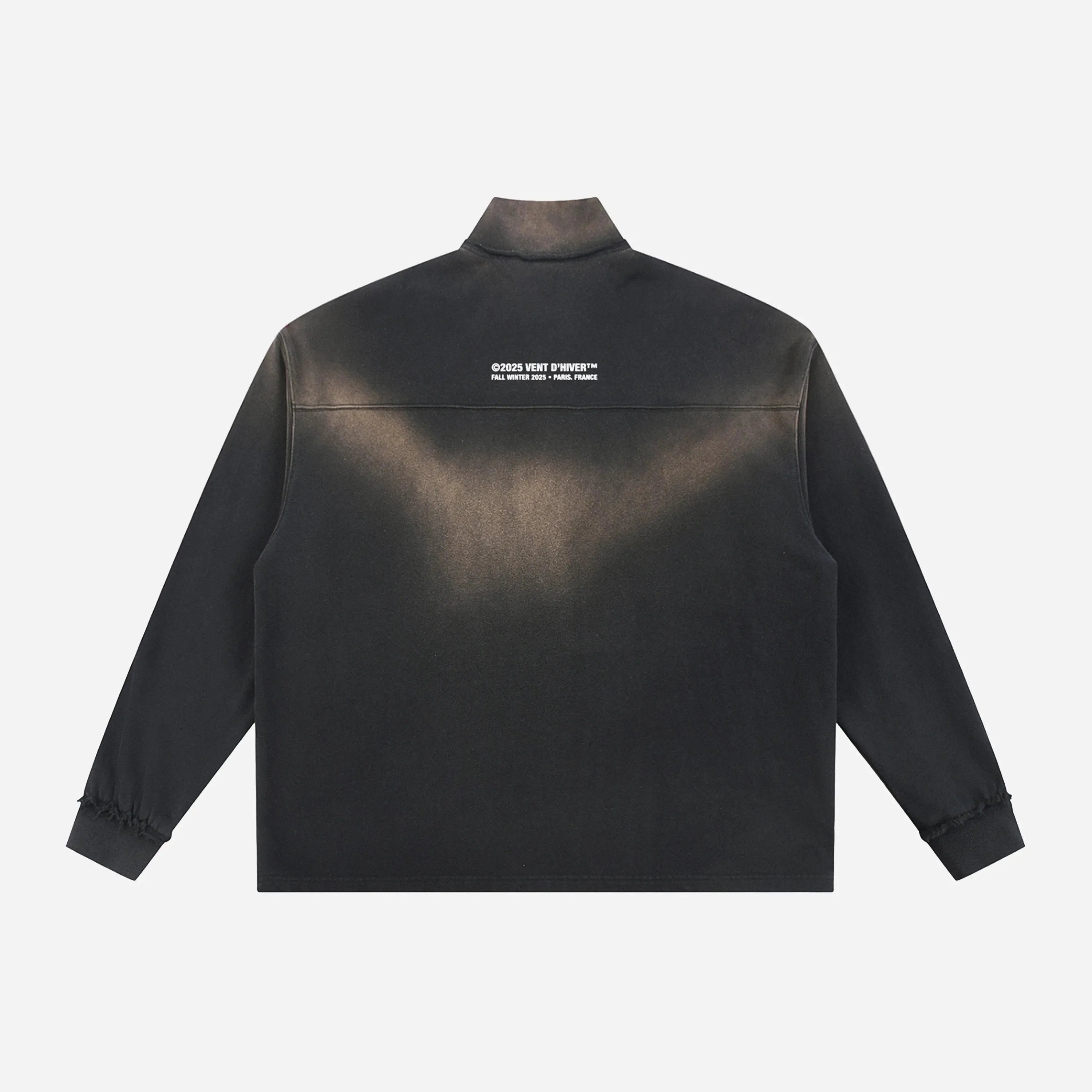 Quarter Zip by VENT D'HIVER with text on the back against a white background